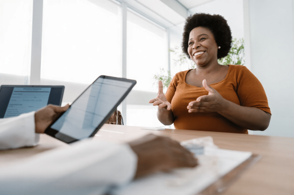 A woman is having a thorough appointment with clear monitoring criteria for the next phase of weight loss.