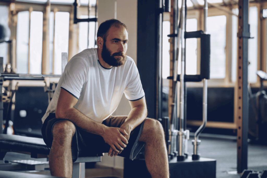 Loss of muscle mass despite consistent exercise can be a sign of declining testosterone.