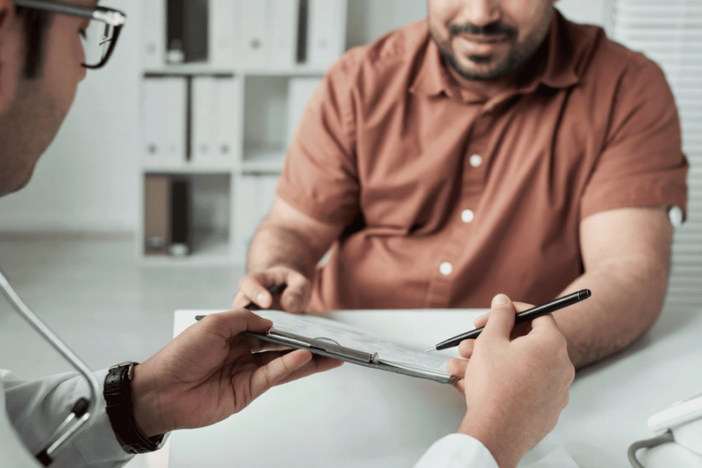 A man is having a thorough clinical interview for a testosterone evaluation.