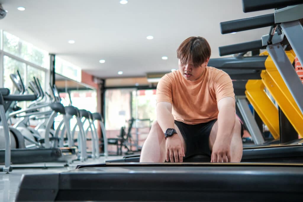 A man has been trying to diet and exercise regularly, but still hasn't seen any significant weight loss results.