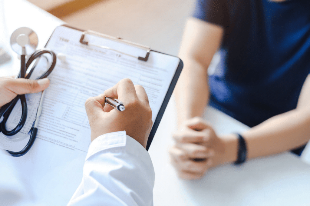 A man is discussing his low T with a doctor before committing to a protocol.