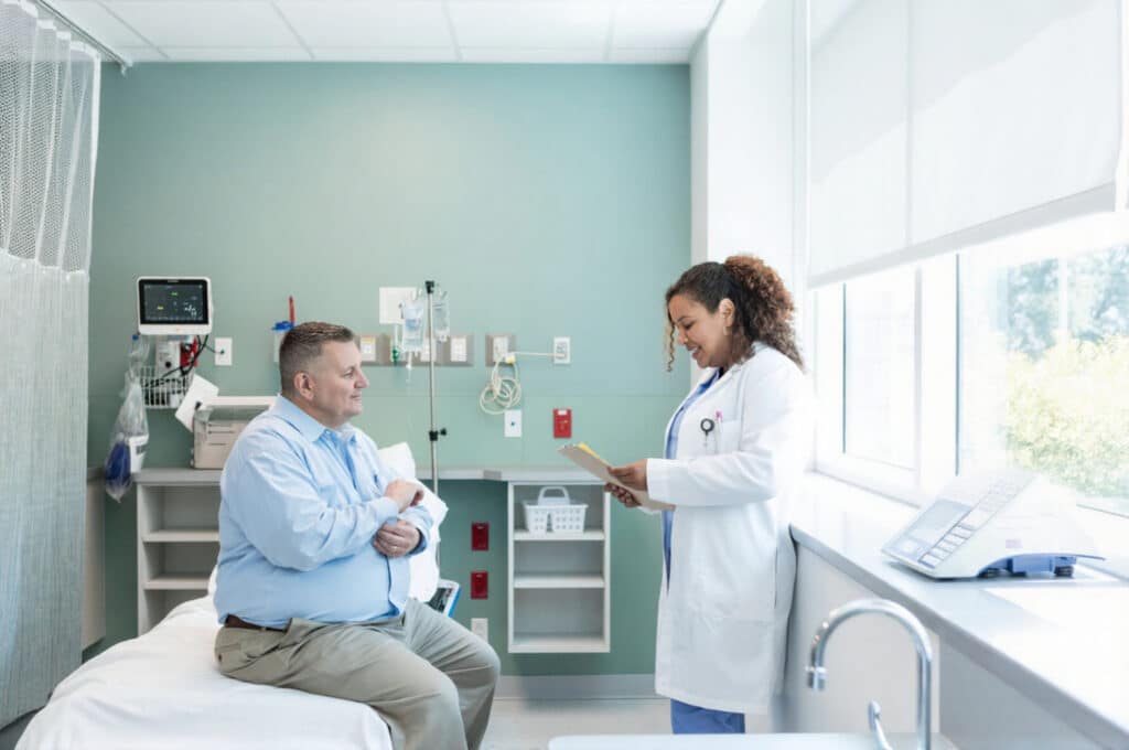 A man reports to the clinician the fatigue he is experiencing when starting medical weight loss.