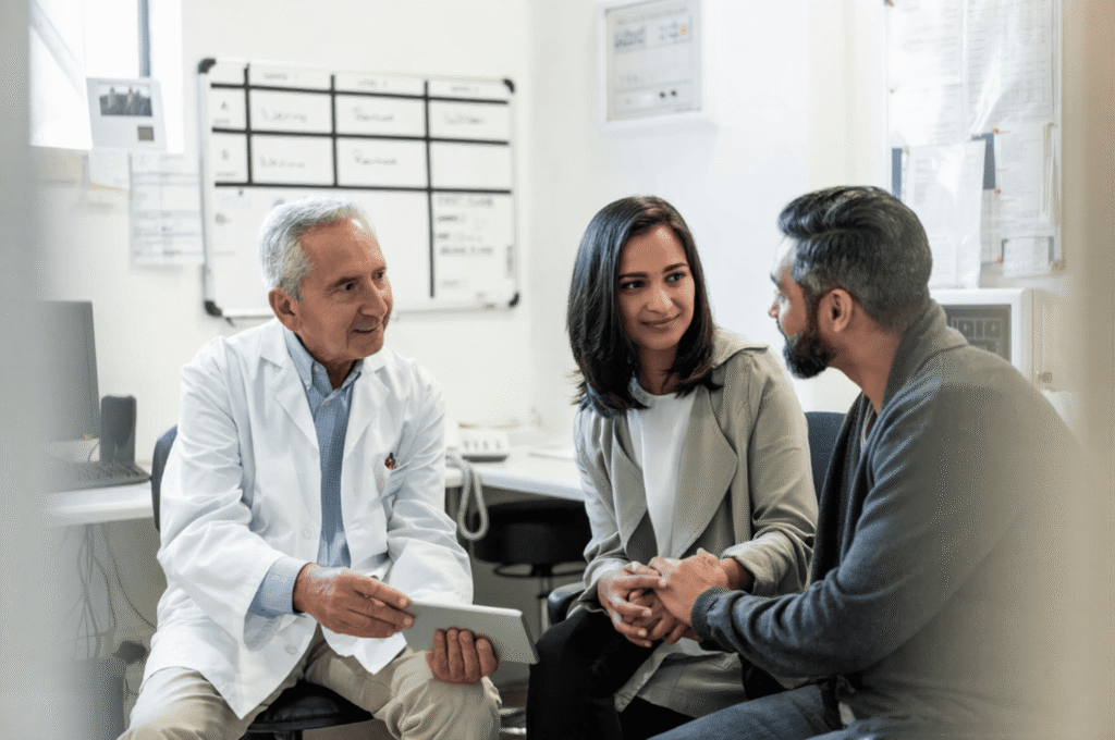 A doctor is consulting a couple on testosterone therapy based on their family planning goals.